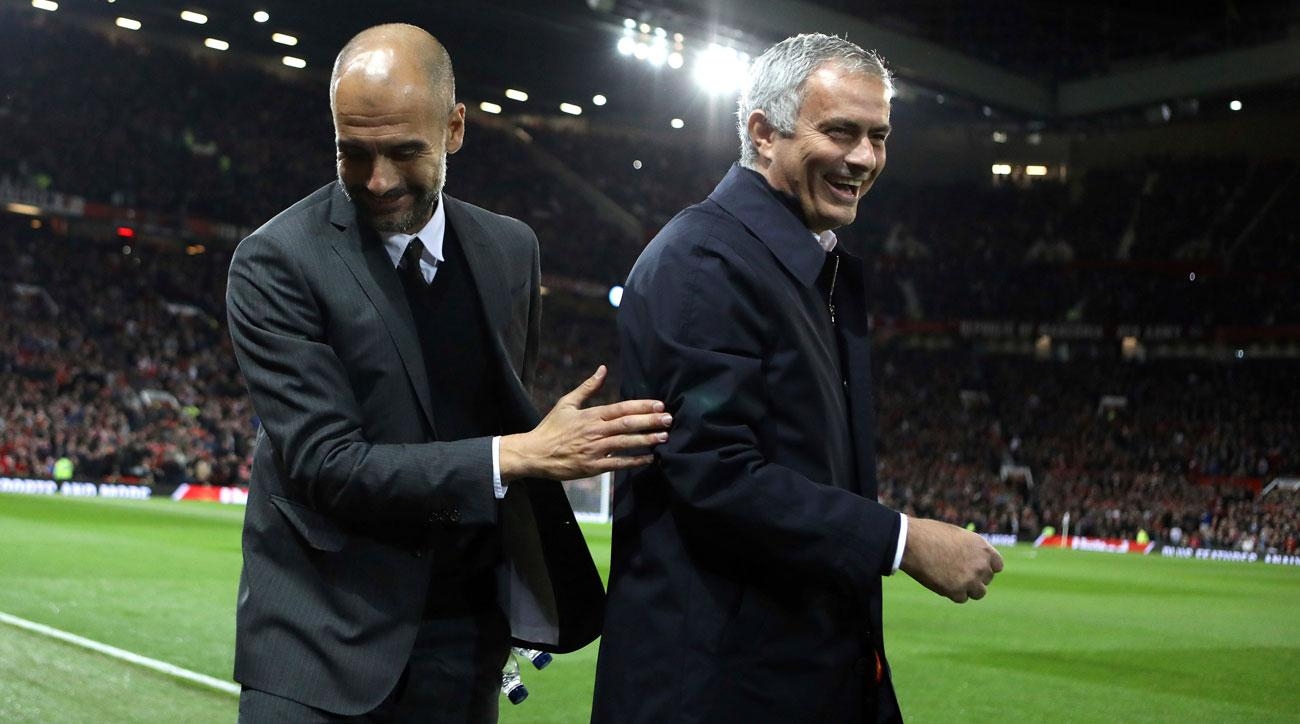 Pep và Mourinho trong một trận đấu giữa 2 đội cùng thành phố Manchester