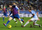 Messi uy hiếp hậu vệ Malaga-FCBVN.jpg