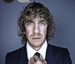 carles-puyol-trajeado-para-entrevista-1419331590308.jpg