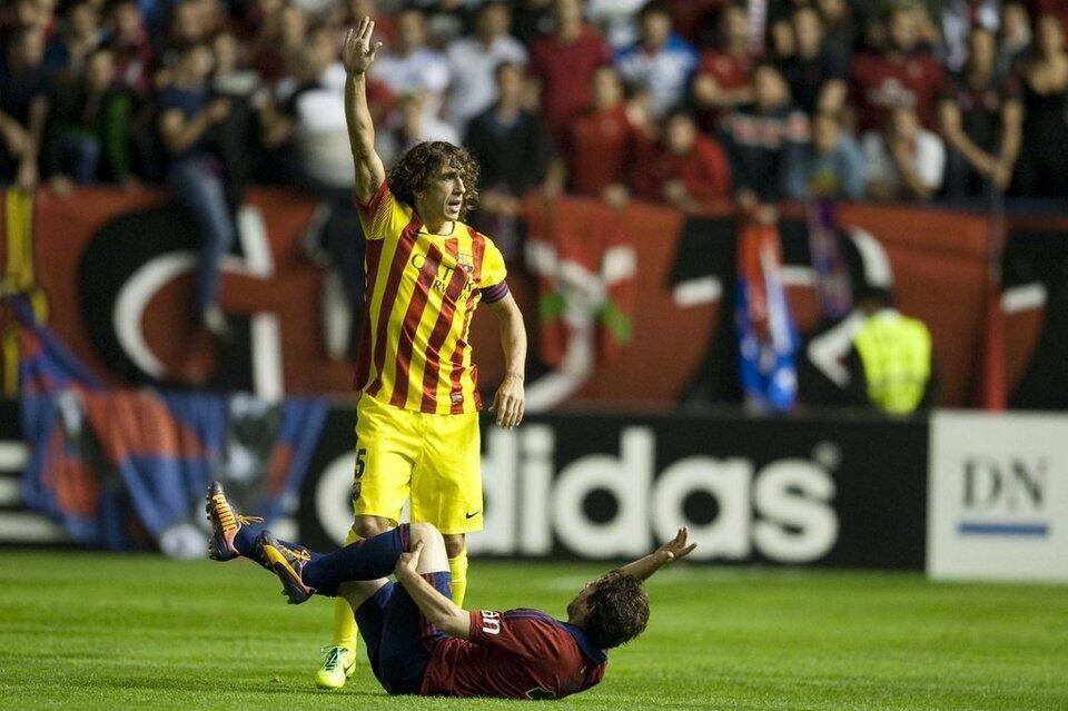 Puyol trong trận đấu với Osasuna